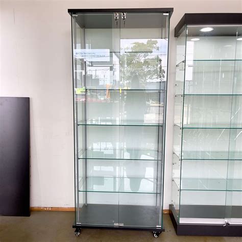 steel wood glass lockable display cabinet|adjustable displays with glass shelves.